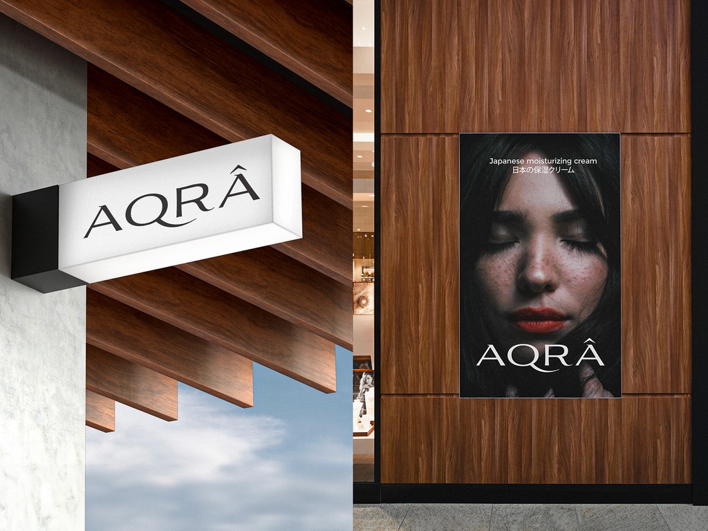 AQRA storefront sign and poster