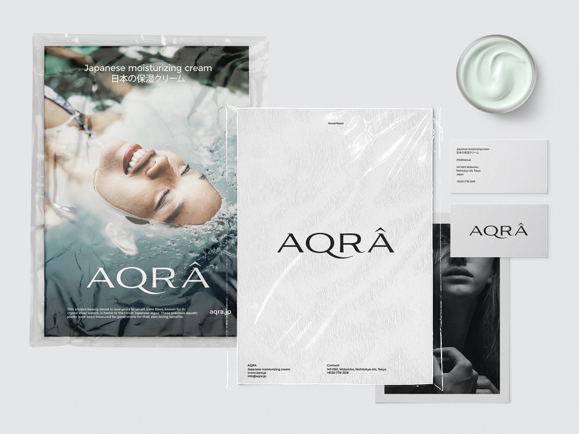 AQRA stationery — poster, report cover and business cards